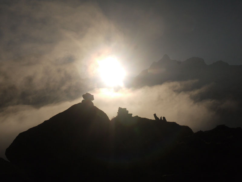 Sun rises high above the peaks of the Annapurna Sanctuary