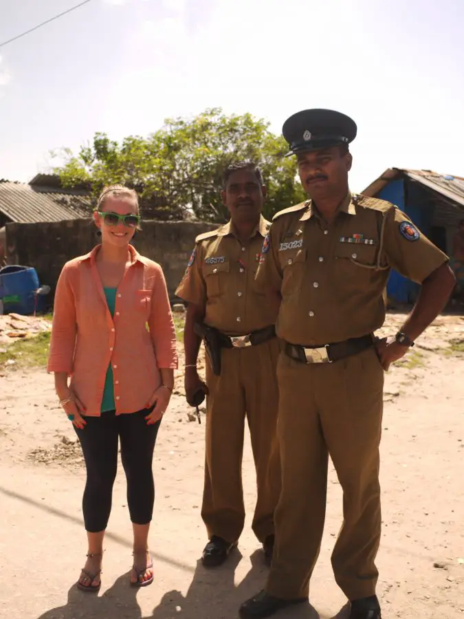 Wandering around the devastated community at Beach Road, these policemen approached us just to have their picture taken and have a chat.