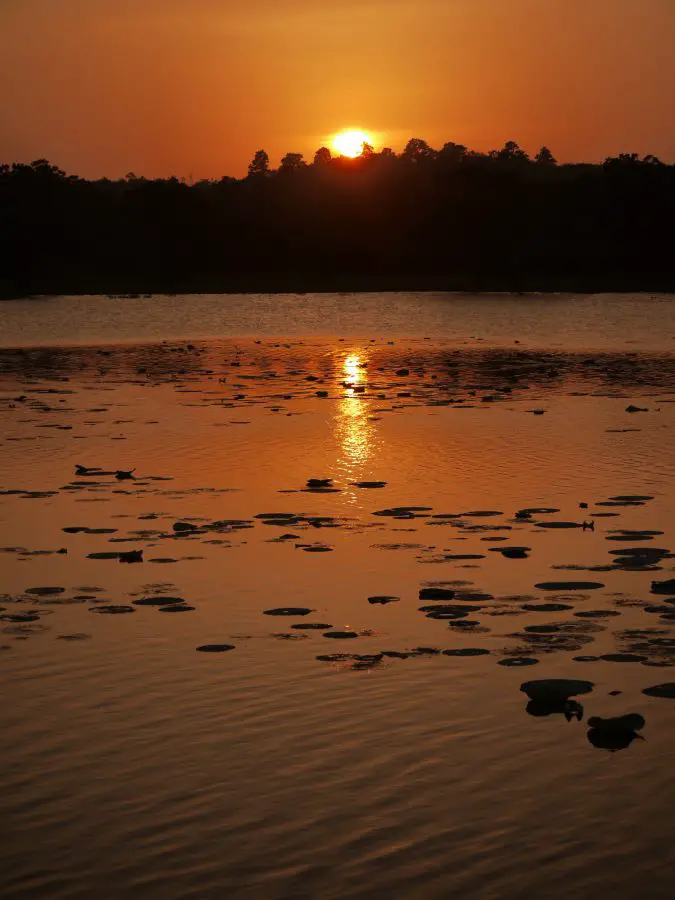 Beautiful sunset over a lake on the Inamaluwa-Sigiriya Road.