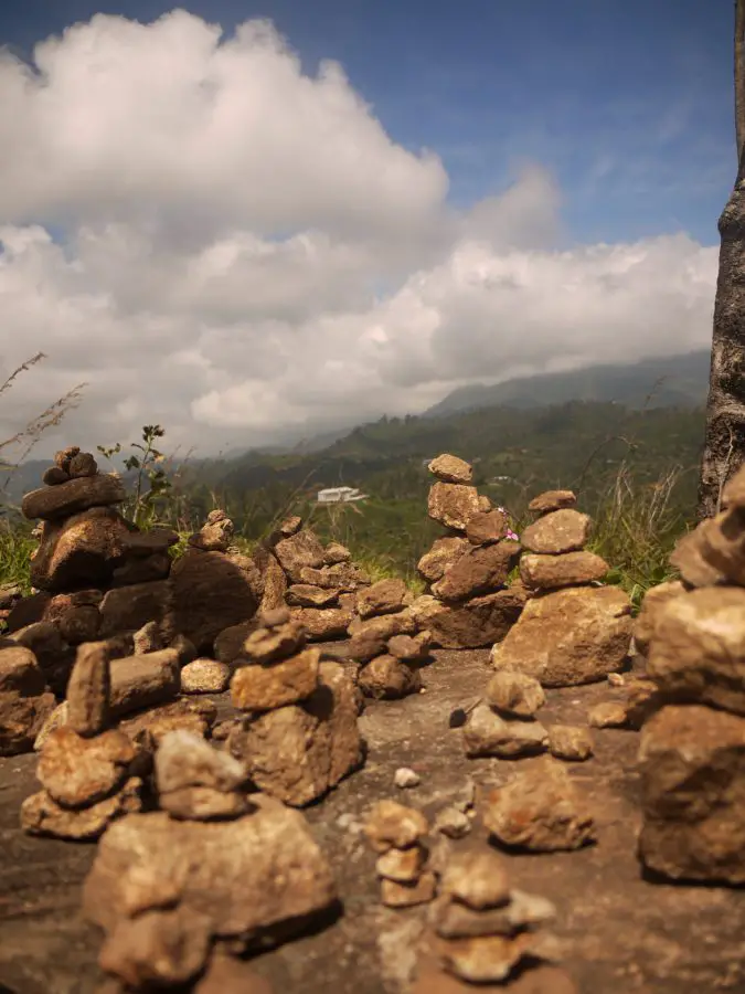 Balancing stones on top of Little Adam's Peak, Ella, Sri Lanka