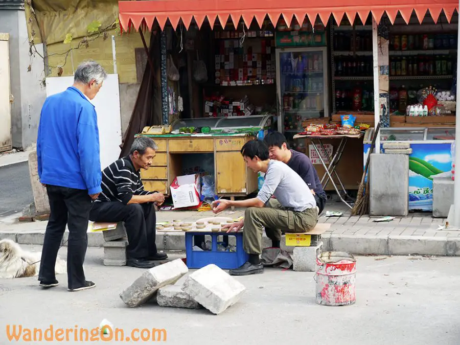 Men Playing Chinese Checkers in the Hutongs of Beijing
