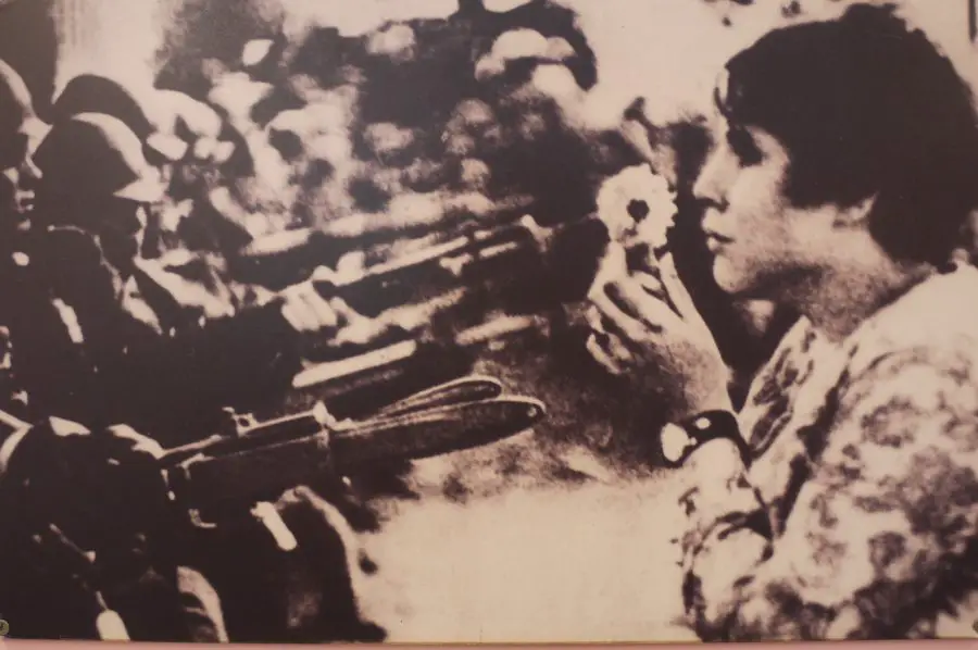 Iconic photo of a protestor putting a flower into the barrel of a soldiers gun during demonstrations against the Vietnam War. From the War Remnants Museum, Ho Chi Minh City