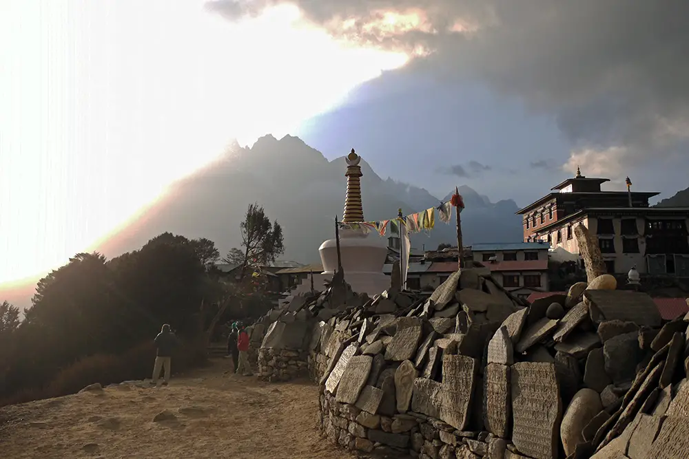 Sun breaking through the clouds at Tengboche