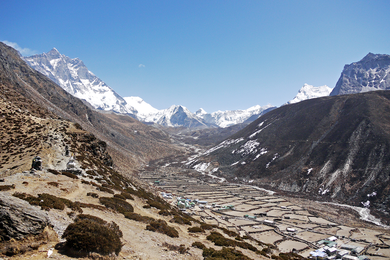 Looking down the valley from above Pheriche while hiking the Everest Base Camp Trek independently | 