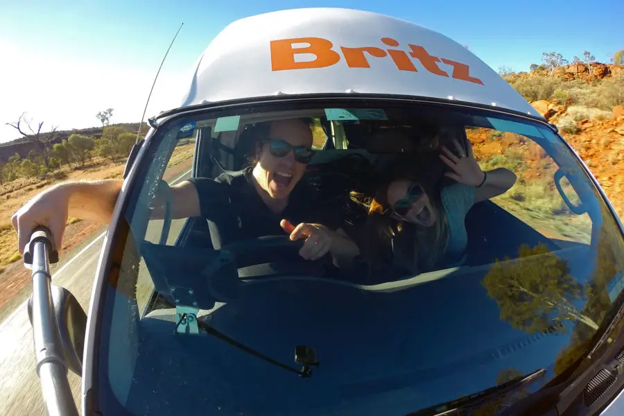 Selfie wile driving a camper van through the outback in Australia | World Nomads