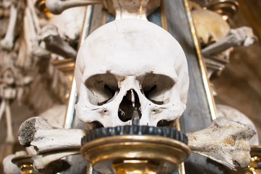 A candelabra featuring bones | A day trip from Prague to Kutna Hora bone church